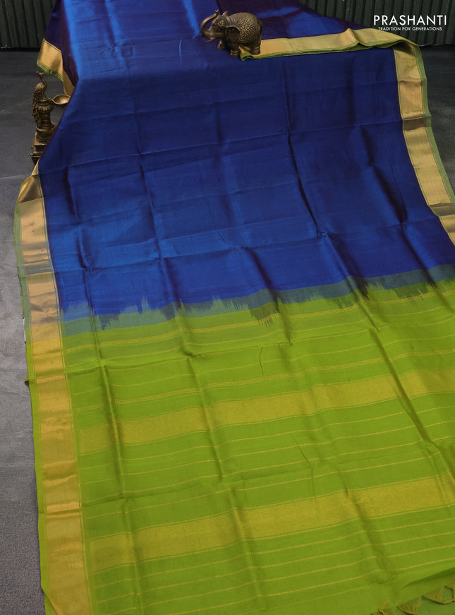 Silk cotton saree peacock blue and light green with plain body and zari woven border