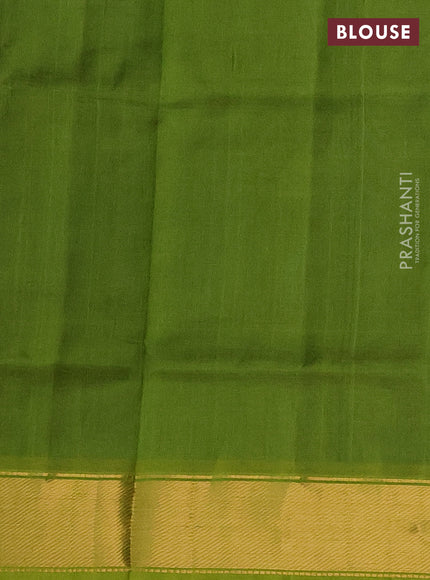 Silk cotton saree peacock blue and light green with plain body and zari woven border