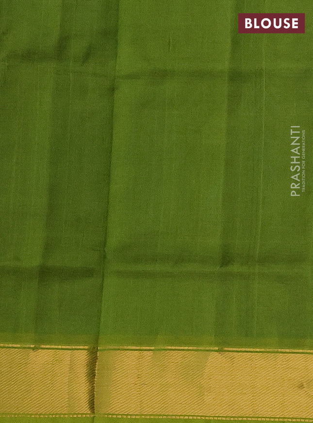 Silk cotton saree peacock blue and light green with plain body and zari woven border