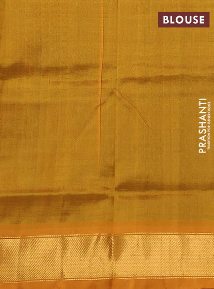 Silk cotton saree green and mustard yellow with plain body and zari woven border