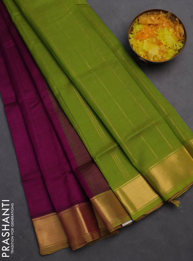 Silk cotton saree purple and light green with plain body and zari woven border