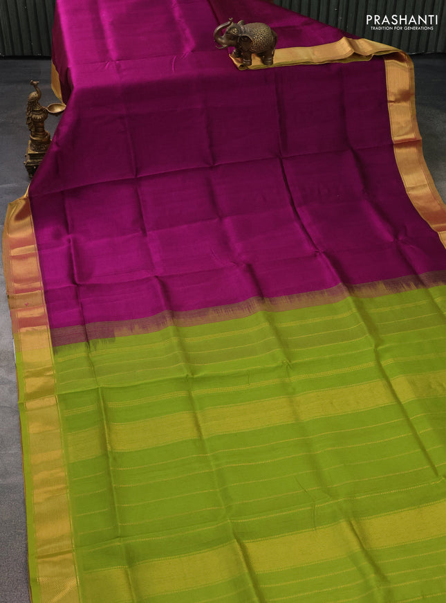 Silk cotton saree purple and light green with plain body and zari woven border