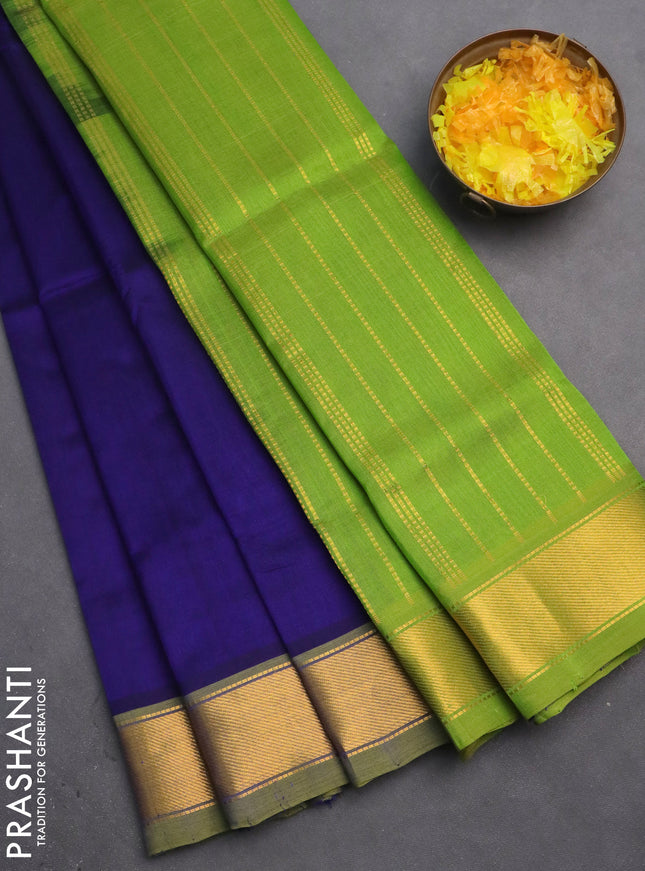 Silk cotton saree blue and light green with plain body and zari woven border