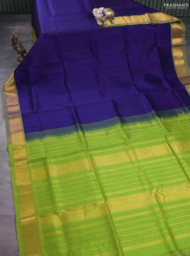 Silk cotton saree blue and light green with plain body and zari woven border