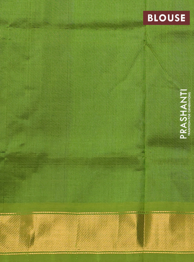 Silk cotton saree blue and light green with plain body and zari woven border