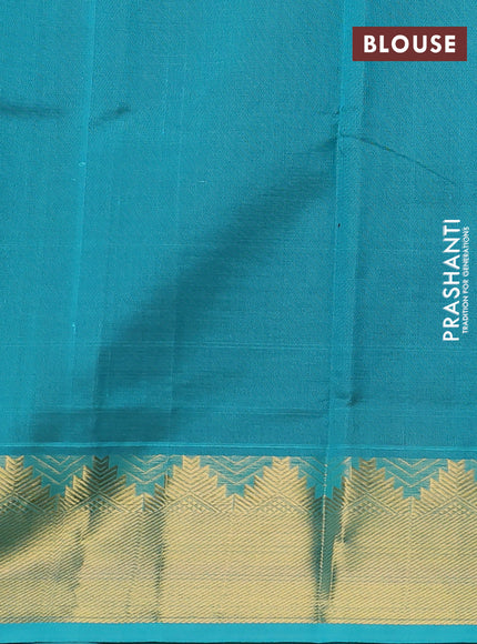 Silk cotton saree wine shade and teal blue with plain body and zari woven border