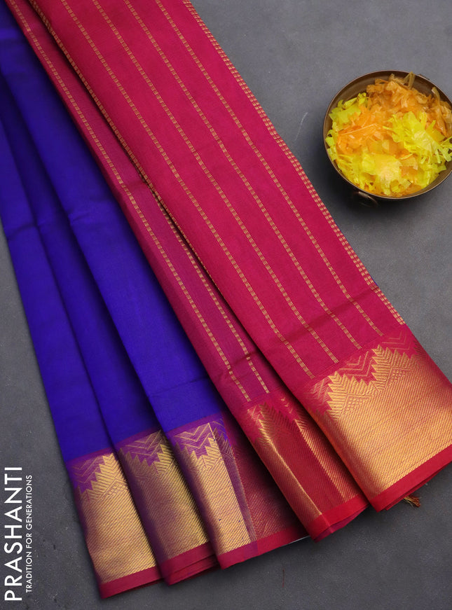 Silk cotton saree blue and dark pink with plain body and zari woven border