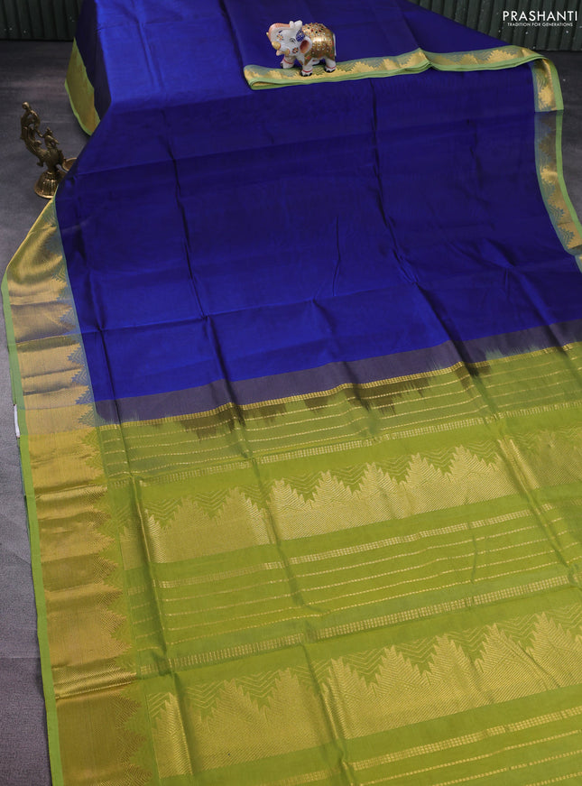 Silk cotton saree blue and light green with plain body and zari woven border