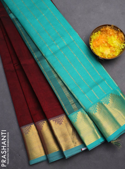 Silk cotton saree maroon and teal blue with plain body and zari woven border