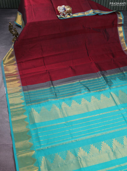 Silk cotton saree maroon and teal blue with plain body and zari woven border