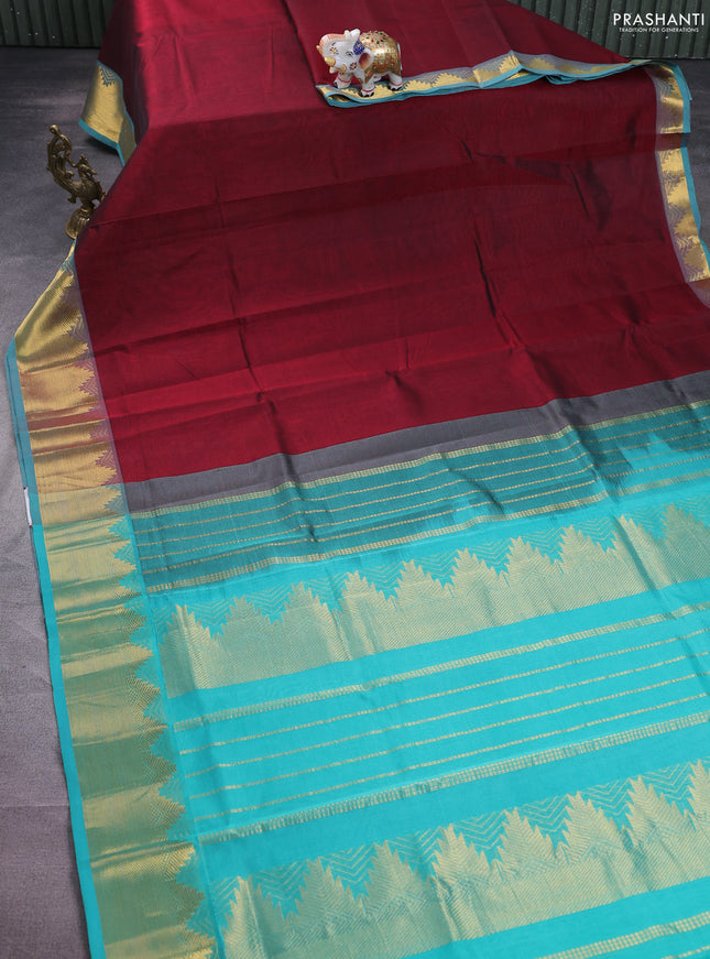 Silk cotton saree maroon and teal blue with plain body and zari woven border