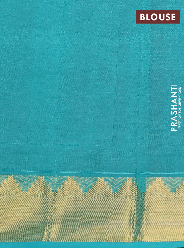 Silk cotton saree maroon and teal blue with plain body and zari woven border
