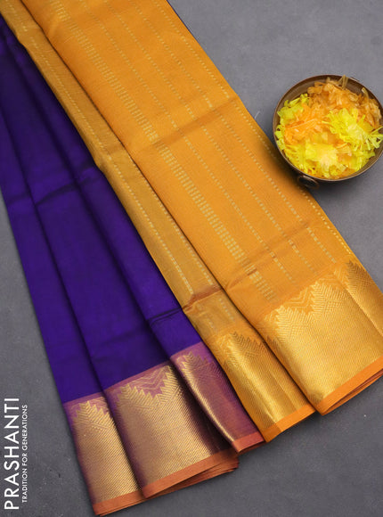 Silk cotton saree blue and mustard yellow with plain body and zari woven border