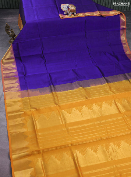 Silk cotton saree blue and mustard yellow with plain body and zari woven border