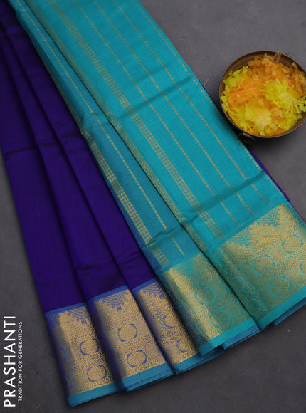 Silk cotton saree dark blue and teal blue with plain body and zari woven border