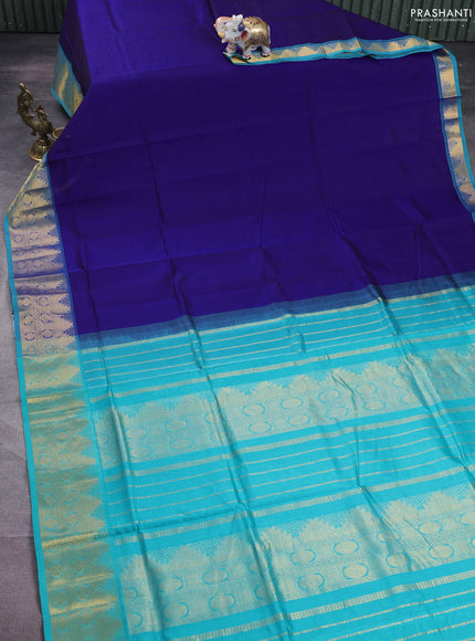 Silk cotton saree dark blue and teal blue with plain body and zari woven border