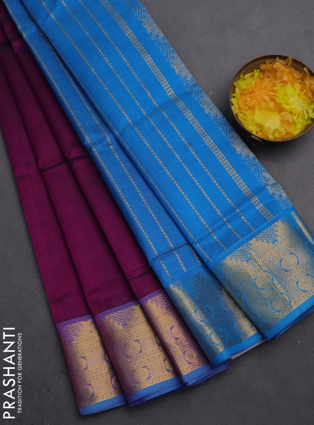 Silk cotton saree purple and cs blue with plain body and zari woven border