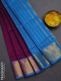 Silk cotton saree purple and cs blue with plain body and zari woven border