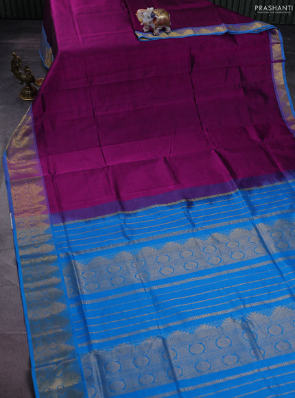 Silk cotton saree purple and cs blue with plain body and zari woven border