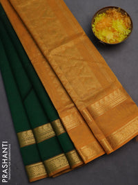 Silk cotton saree dark green and mustard yellow with plain body and rettapet zari woven border