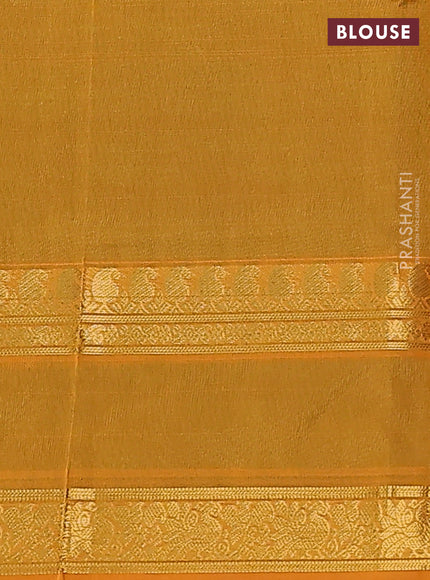 Silk cotton saree dark green and mustard yellow with plain body and rettapet zari woven border