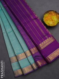 Silk cotton saree teal blue and purple with plain body and rettapet zari woven border