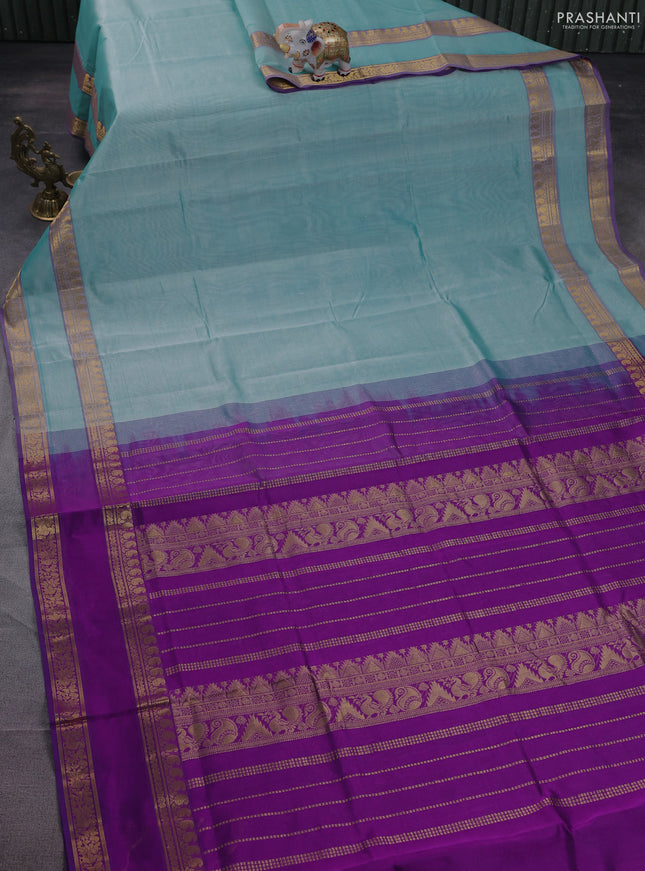 Silk cotton saree teal blue and purple with plain body and rettapet zari woven border