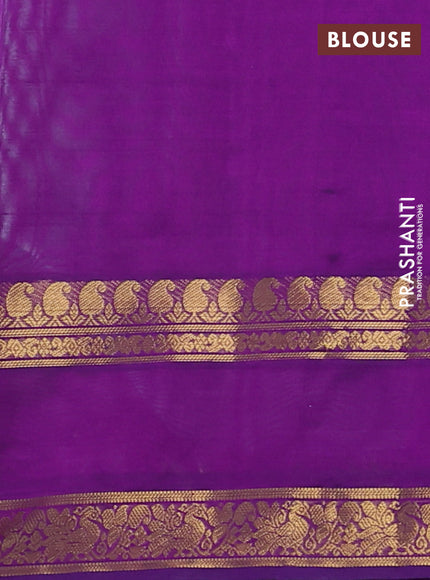 Silk cotton saree teal blue and purple with plain body and rettapet zari woven border