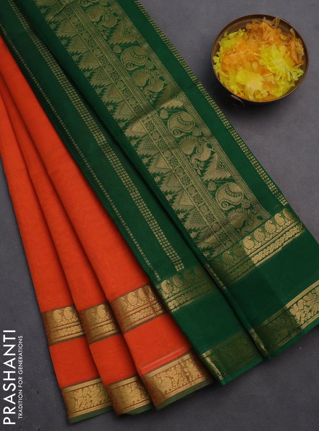 Silk cotton saree orange and green with plain body and rettapet zari woven border