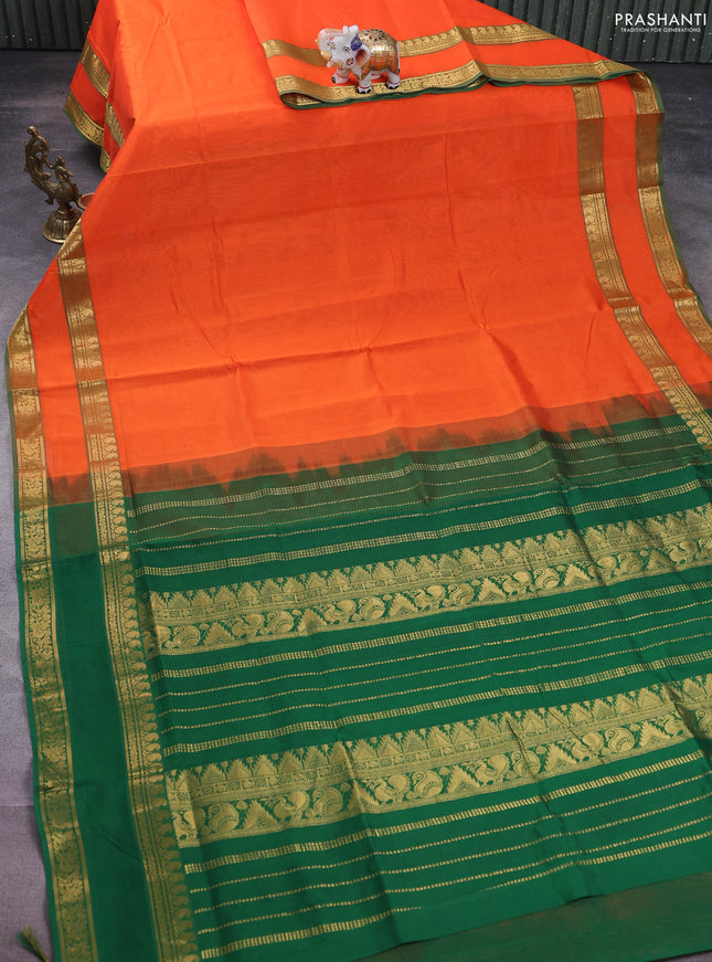 Silk cotton saree orange and green with plain body and rettapet zari woven border