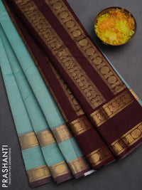 Silk cotton saree teal blue and deep maroon with plain body and rettapet zari woven border