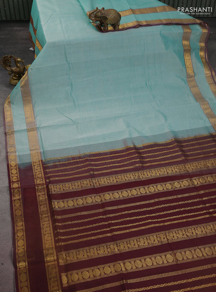 Silk cotton saree teal blue and deep maroon with plain body and rettapet zari woven border