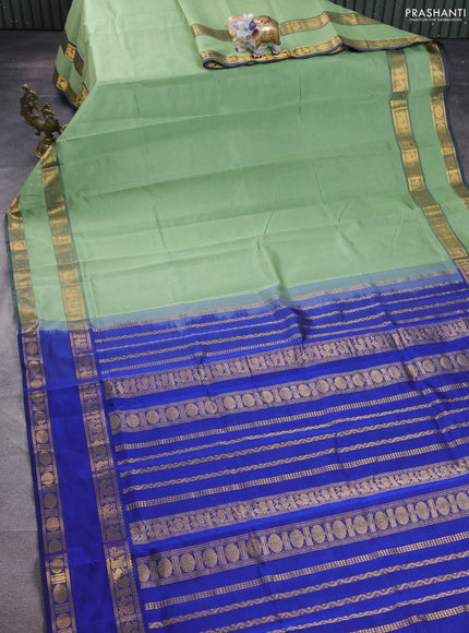 Silk cotton saree pastel green and blue with plain body and rettapet zari woven border