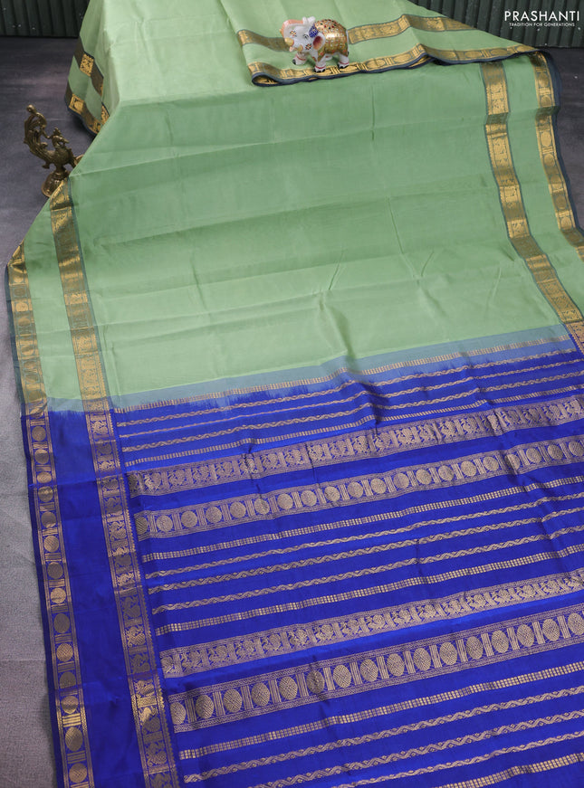 Silk cotton saree pastel green and blue with plain body and rettapet zari woven border