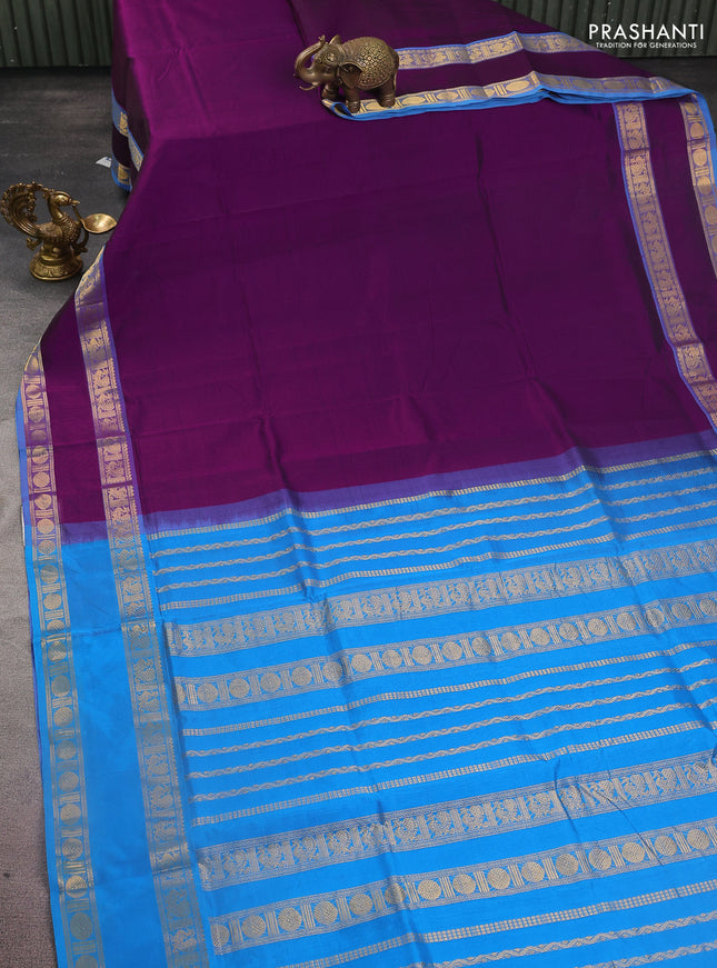 Silk cotton saree purple and cs blue with plain body and rettapet zari woven border