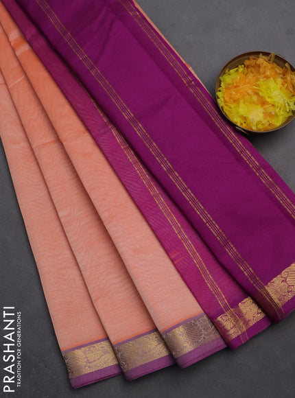 Silk cotton saree orange and purple with plain body and zari woven border