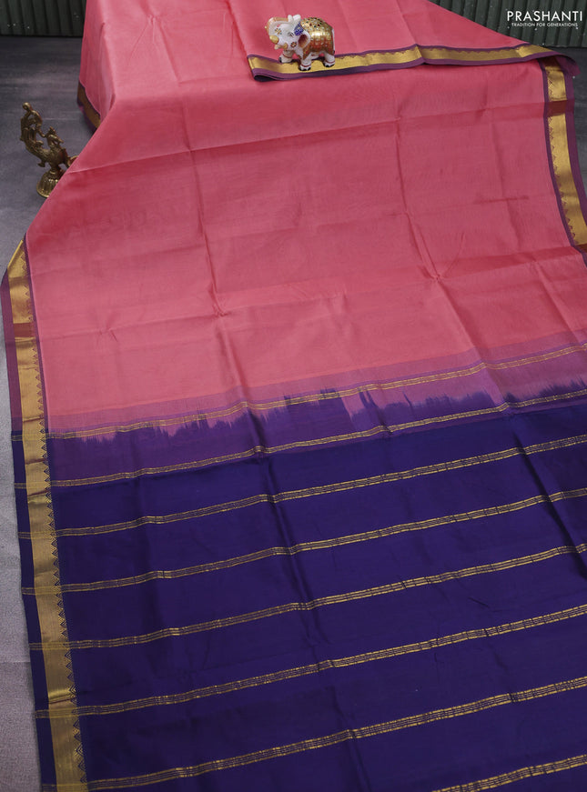 Silk cotton saree peach pink and purple with plain body and zari woven border