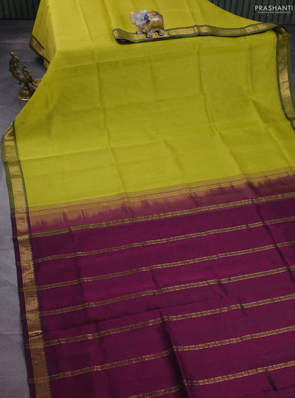 Silk cotton saree lime yellow and purple with plain body and zari woven border