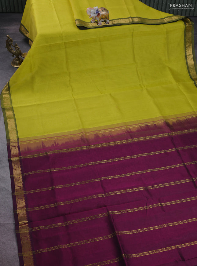 Silk cotton saree lime yellow and purple with plain body and zari woven border