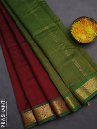 Silk cotton saree maroon and mehendi green with plain body and zari woven border