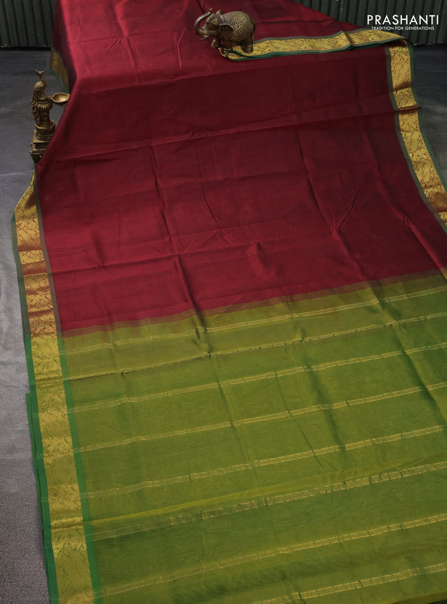 Silk cotton saree maroon and mehendi green with plain body and zari woven border