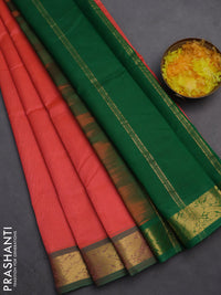Silk cotton saree dual shade of peach pink and green with plain body and zari woven border