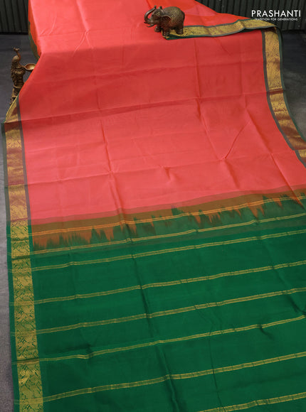 Silk cotton saree dual shade of peach pink and green with plain body and zari woven border