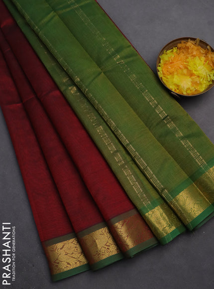 Silk cotton saree maroon and mehendi green with plain body and zari woven border