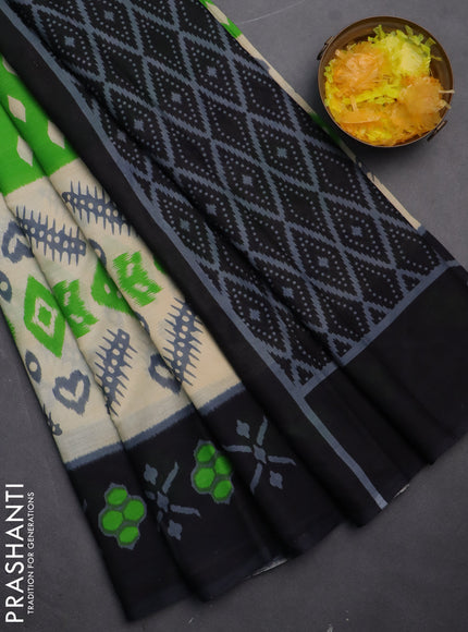 Jaipur cotton saree light green and black with allover ikat prints and printed border