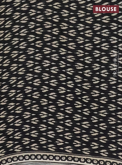 Jaipur cotton saree light green and black with allover ikat prints and printed border