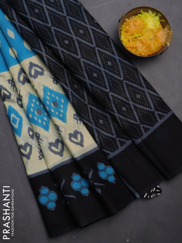 Jaipur cotton saree light blue and black with allover ikat prints and printed border