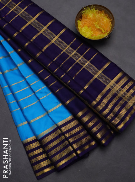 Semi mysore silk saree light blue and navy blue with allover zari stripes pattern and zari woven border
