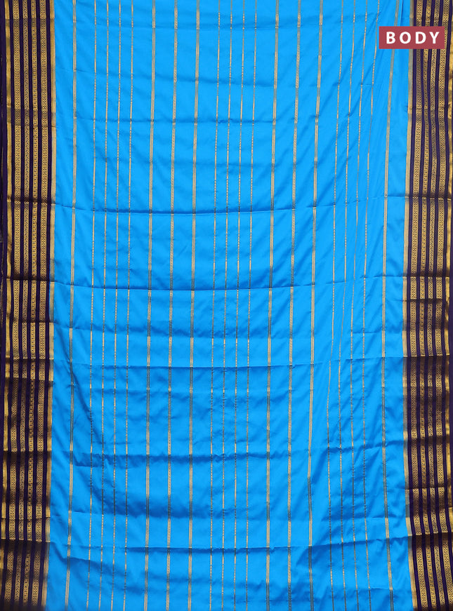 Semi mysore silk saree light blue and navy blue with allover zari stripes pattern and zari woven border