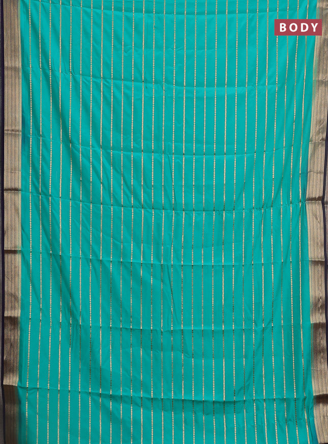Semi mysore silk saree teal green and deep violet with allover veldhari weaves and zari woven border